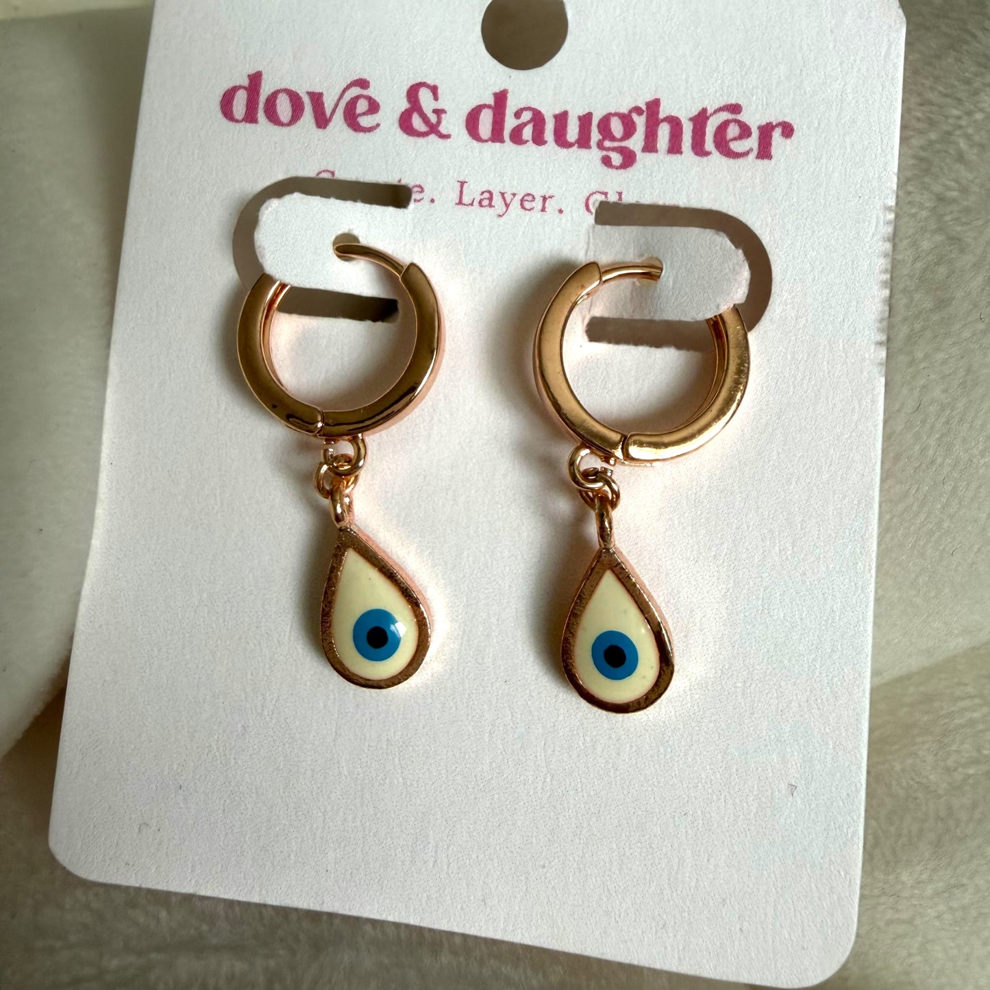 Rose gold evil eye hoops