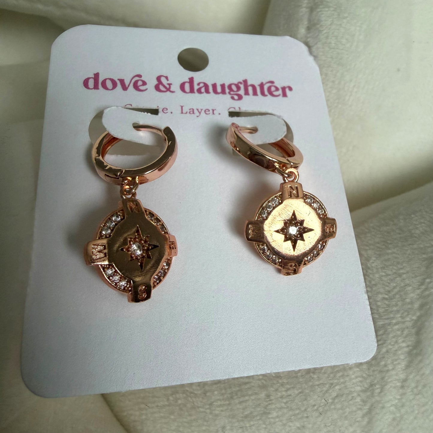Rose gold compass hoops